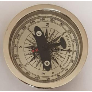Kompas met vliegtuig als kompasnaald